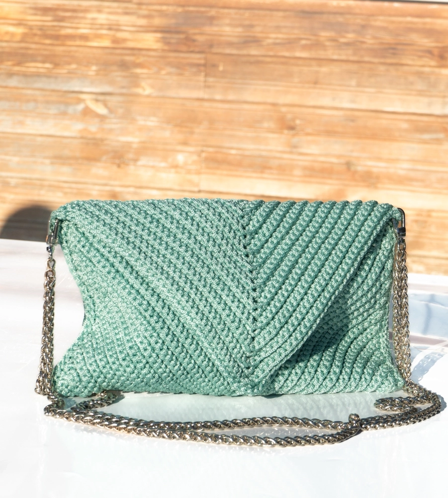 Demir zincirli kol çantası